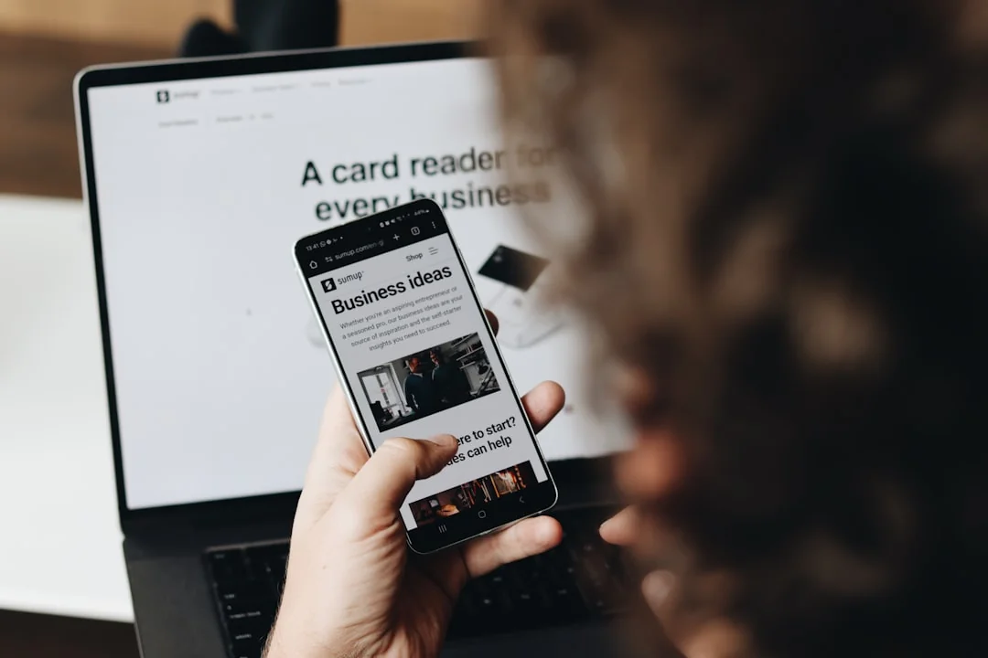 A sleek smartphone displaying artwork in a minimalist setting, perfect for tech and design themes.